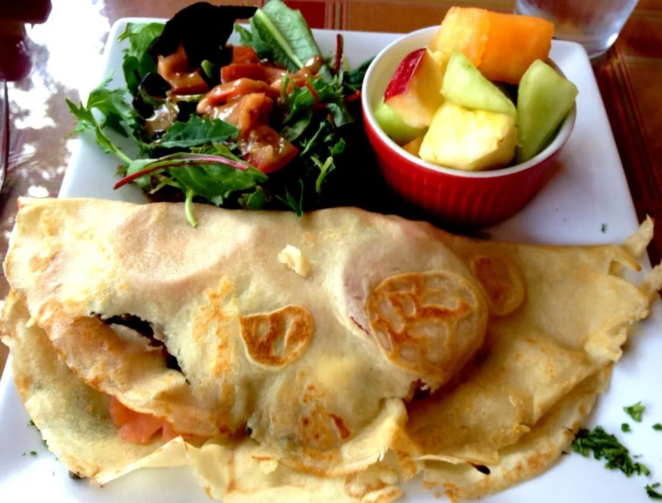 Snapdishの料理写真:Smoked Salmon Crepe with Salad and Fruit from Cafe Laurent|sooprcoolchicaさん