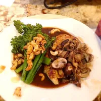 Snapdishの料理写真:Chicken Marsala with broccoli rabe and caramelized cashews|Connor Kuciさん