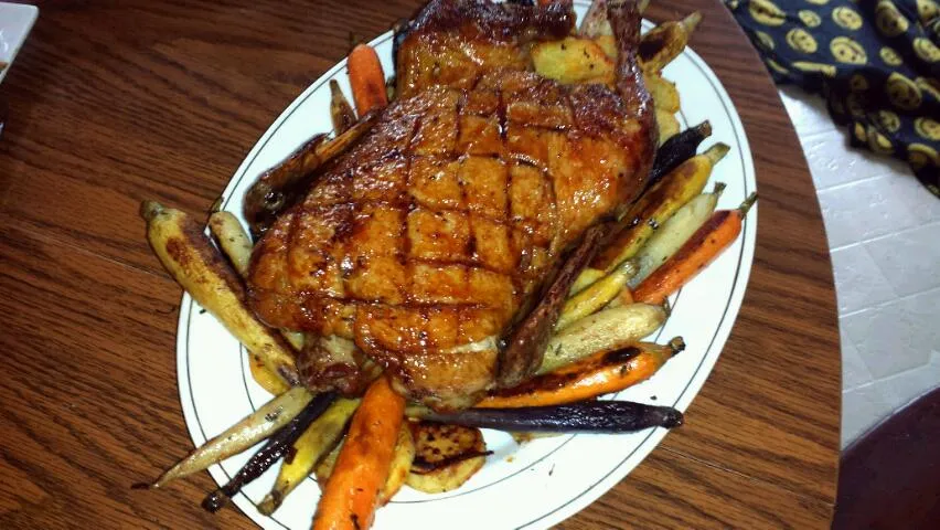 whole roasted duck with roasted with sweat potatoes and roasted artisan carrots|Jacki Carterさん