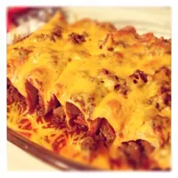 Snapdishの料理写真:Beef and cheese enchiladas|Rachel Miranda Mastersさん