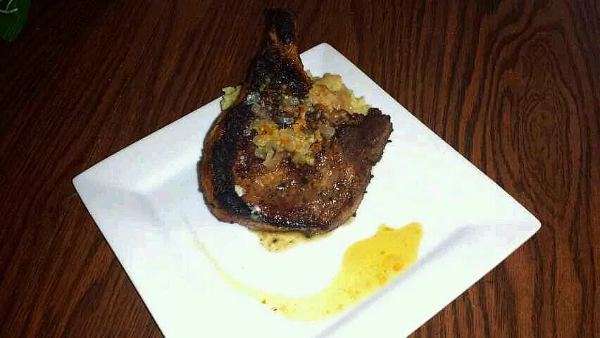 pork chop with an orange infused white wine and honey glaze over orange infused white sweet potato mash|Jacki Carterさん