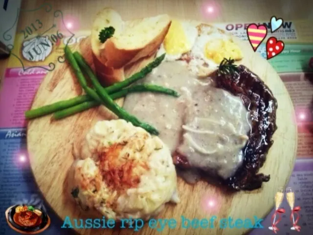 Snapdishの料理写真:Grilled Aussie rip eye beef steak wild mushroom sauce and with potatoes dauphinoise|Mare Kieさん