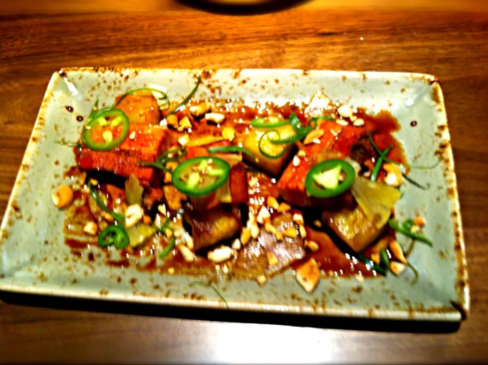 Whiskey Braised Pork Belly, grilled pineapple, soy reduction, cashews, jalapeño.|Dan Asikainenさん