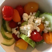 Cucumbers with cherry tomatoes and feta cheese, apple cider vinegar, stevia and salt- chilled|molly laportaさん