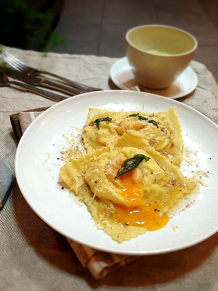 Egg yolk,truffle ricotta ravioli with sage and brown butter|rick chanさん