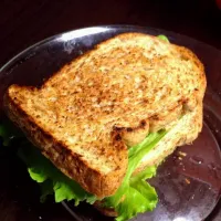 Snapdishの料理写真:toasted wholemeal bread with tuna flakes season with salt,pepper and parmesan cheese. Add in lettuce and tomato