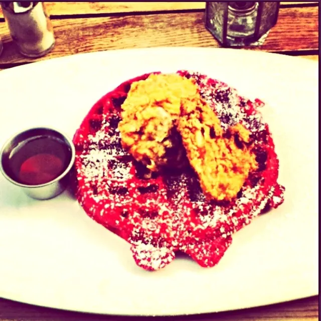 Snapdishの料理写真:Now this was a real treat. A red velvet waffle topped with powdered sugar and a perfectly fried chicken breast. What a lovely combination !|simone cheeksさん