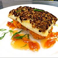 Pecan crusted halibut with sweet potato mash and peach compote grastrique.