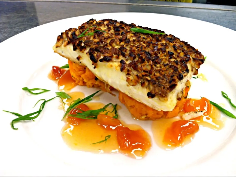 Pecan crusted halibut with sweet potato mash and peach compote grastrique.|Andrew C Messinaさん