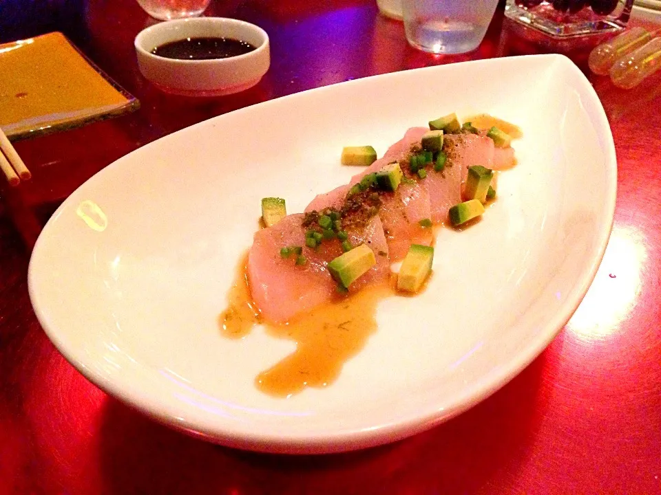 Snapdishの料理写真:Hamachi w/ jalapeño,  avocado and wasabi pepper sauce|Ashley Benzieさん