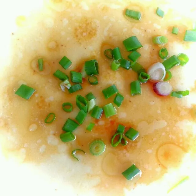 steamed egg with sprinkle of spring onions topped with soy sauce usually eaten with rice with other dishes|yapさん