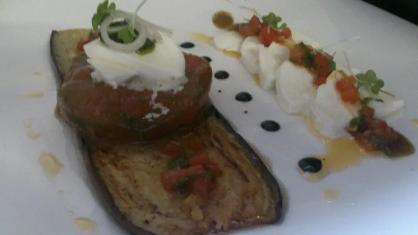 Snapdishの料理写真:Pressed tomato, marinated aubergine, basil and mozzarella.|lee mastinさん