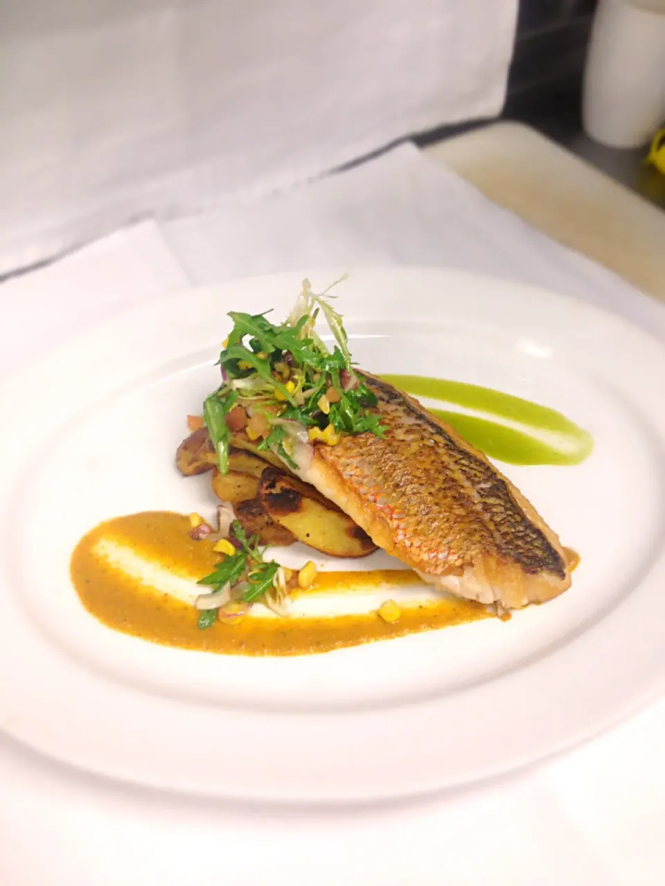 Snapdishの料理写真:Pan seared snapper with roasted fingerling potatoes and a duo of sauces|zac sayersさん