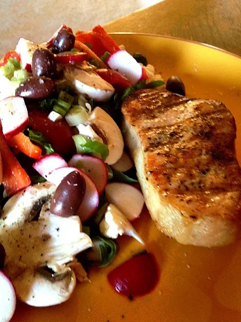 Grilled pork chop with a spinach and feta salad.|amyさん