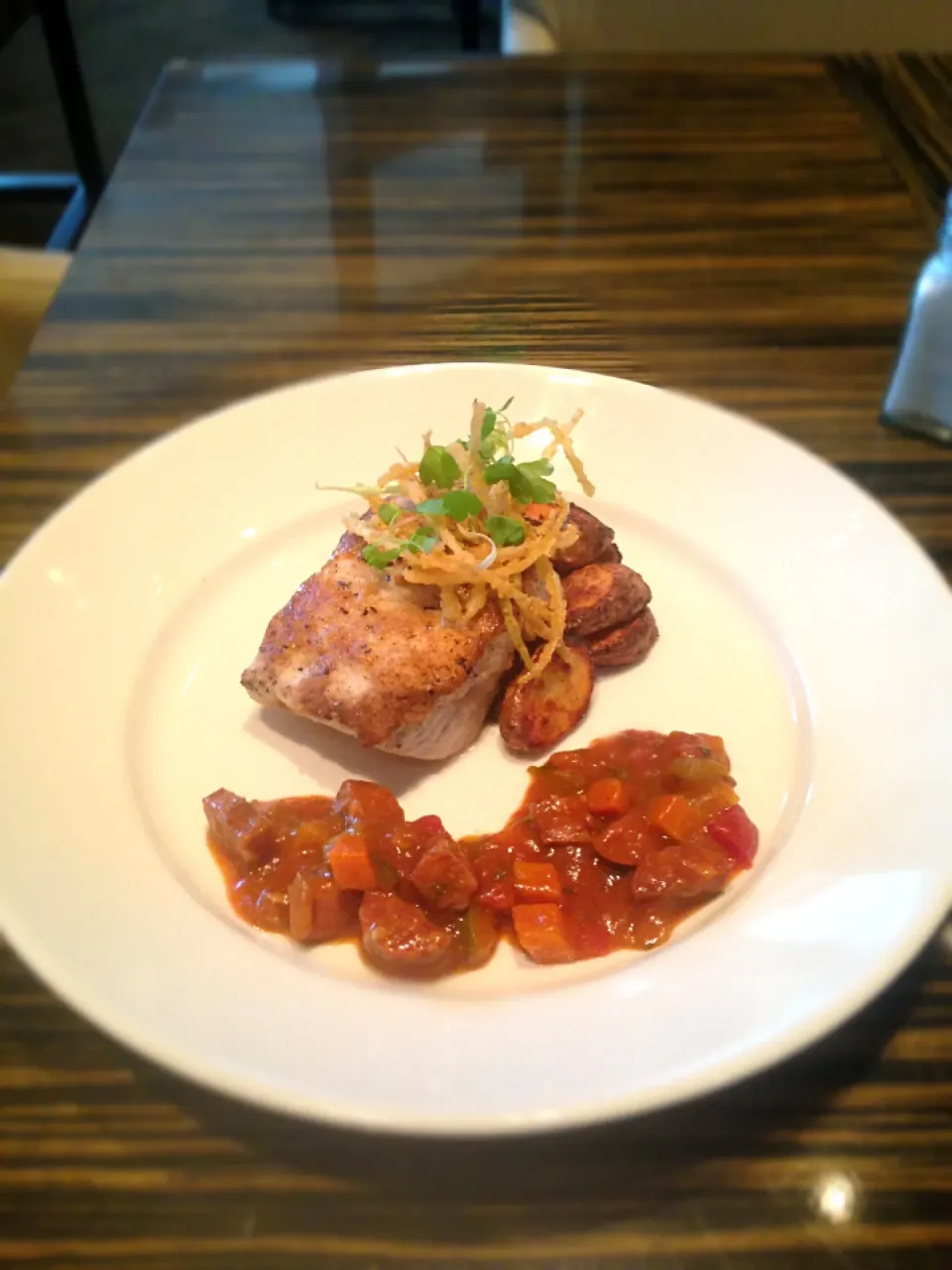 Pan seared mahi with Cajun roasted fingerling potatoes and a chorizo vegetable sauce and fried leeks to garnish|zac sayersさん