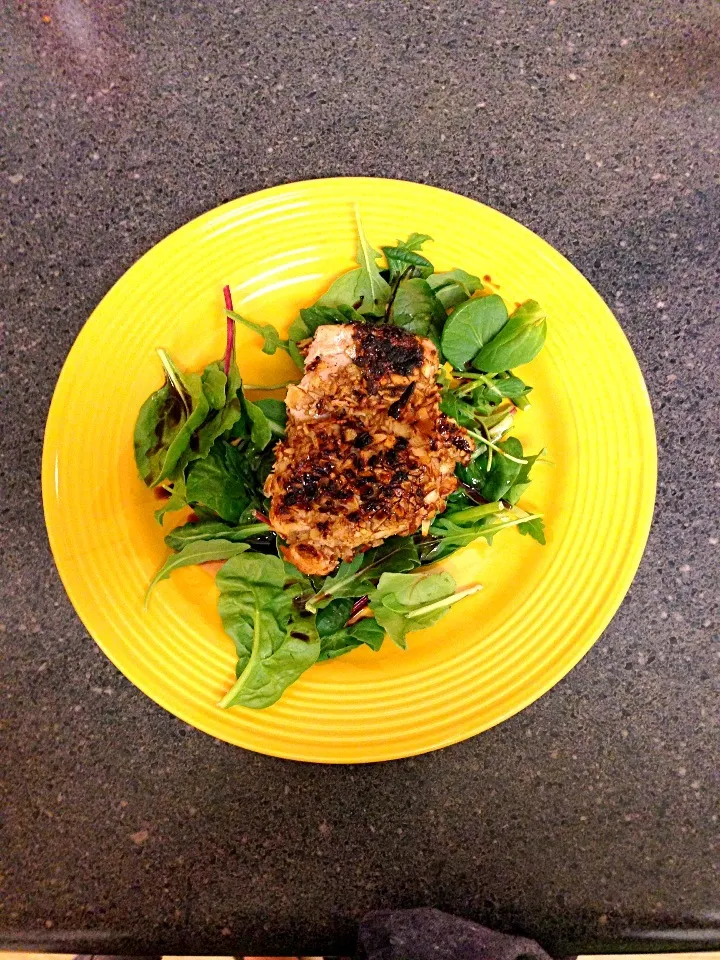 Almond encrusted chicken thigh over bed of arugula, spinach and Swiss chard with drizzle of balsamic vinegar.  It's what's for dinner.|Jacqueline Ballanさん