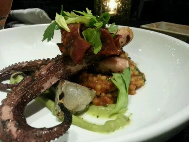 Grilled Octopus with charred avocado, spanish chorizo, fiery tomato couscous|Austin McKennaさん