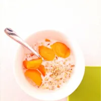 Breakfast - Oats, nuts, milk & Sharon fruit|rachelさん