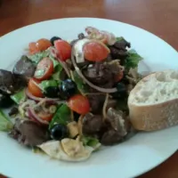 Snapdishの料理写真:salad with olives, lettuce, tomato,  red onion, egg, chicken liver, capers, ansjovis vinaigrette|Jessさん