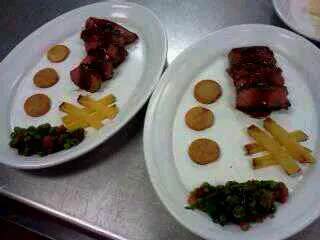 Grilled flank steak, red wine demi, bacon collards, fried potatoes and roasted yellow beet.|Sara Leeさん