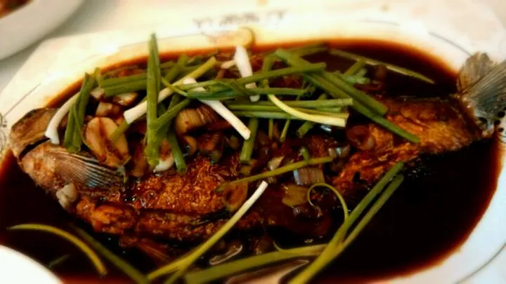 River fish with Chinese wine and baby garlic|Manoleyさん