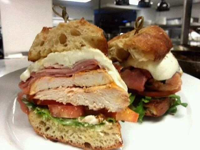 Fresh Mozzarella, Proscuitto Ham, CharGrilled Chicken Breast, Heirloom Tomato & baby Arugula on Ciabatta|Bryan S. Mooreさん