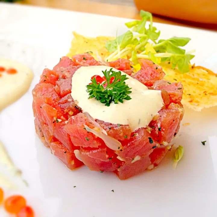 Snapdishの料理写真:Ahi Tartar - served with pomelo, ginger, wasabi aioli and salmon caviar|Pat Zaaさん