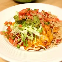 Snapdishの料理写真:Sister Sierra's Spicy, Cheesy Chicken Enchiladas|Meg Davisさん