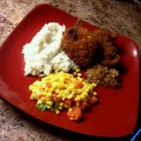 Deep fried panko chicken with honey/bacon/onion jam alongside Jasmin rice and sauteed corn with tomatoes and green onions|Lisa MacLean Rodgersさん