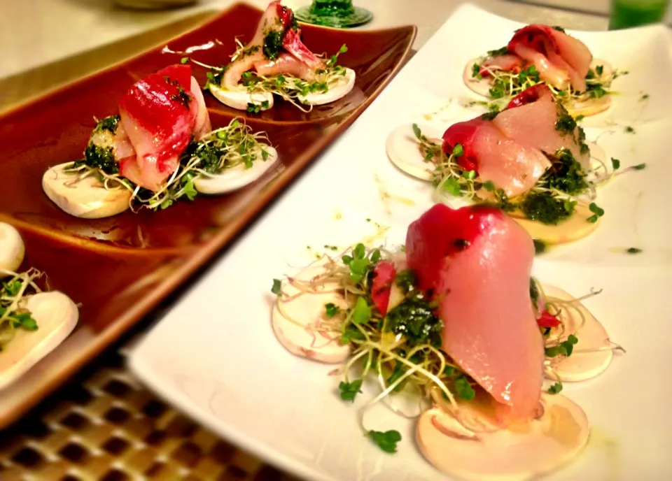 Yellowtail carpaccio with fresh mushrooms and pest dressing.|Kirk Awiamさん