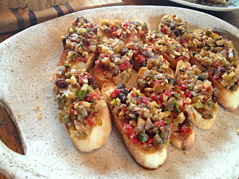 Snapdishの料理写真:crostini: eggplant caponata|Matthew Cashenさん