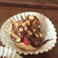 Snapdishの料理写真:Dark chocolate covered strawberry & banana cups topped with almond butter and chopped walnuts|Meghan Tracyさん