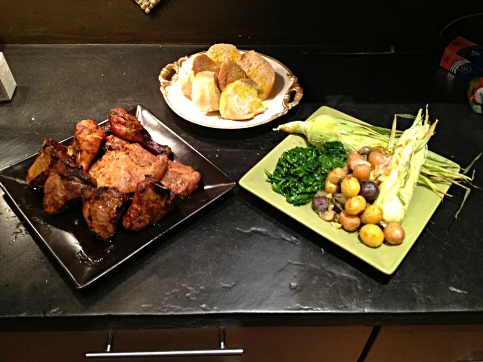 Snapdishの料理写真:I decided to clear out my fridge and grill. :) lamb chops, pork chops, chicken, grilled corn, potatoes, and greens.|nayo satterleeさん