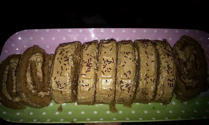 Snapdishの料理写真:swiss roll up with cofee cream|Samia Zouanatさん