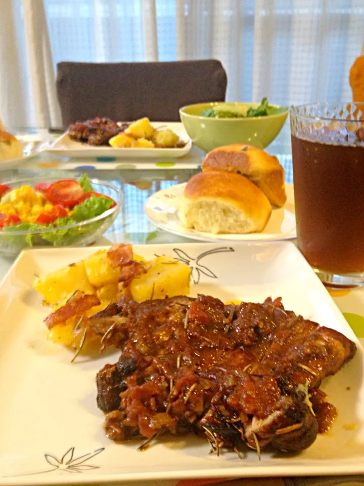 BBQ balsamic chicken,bacon rosemary bake potato,dinner roll and Caesar salad.|kelly ighiriaroさん