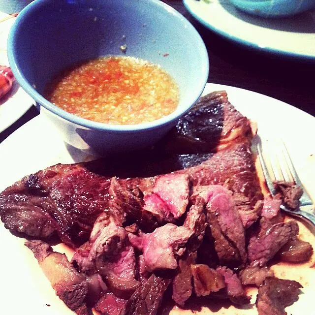 Snapdishの料理写真:MEDIUM Rare Porterhouse with Nam Jing sauce.|Joey Tavares Limさん