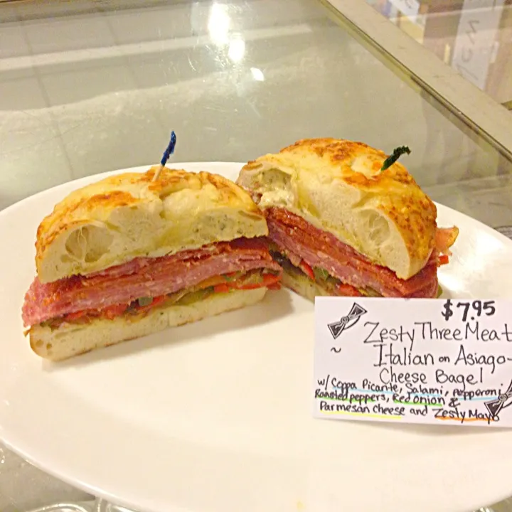 Zesty Three-Meat Italian on Asiago Cheese Bagel, w/ pepperoni, salami, coppa-picante, parmesan, green&red peppers, red onion and a Zesty mayo. #blacktiebistro|D.J. Hansonさん