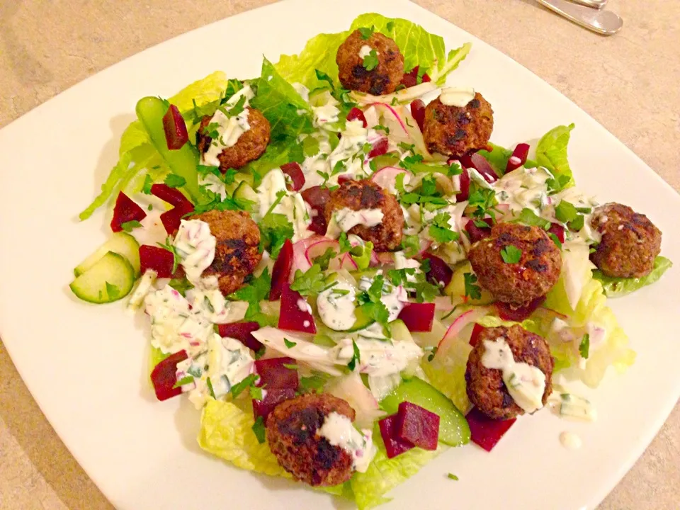 Lamb kofta with salad of fennel pickled red onion cucumber and beet root. Mint coriander yoghurt|Chrisy Hillさん