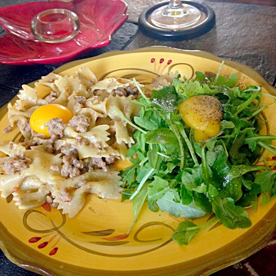 Snapdishの料理写真:Farfalle w/homemade sausage and ground turkey. With a side if Arugula both tipped with olive oil n egg yolk|Keith Hendersonさん