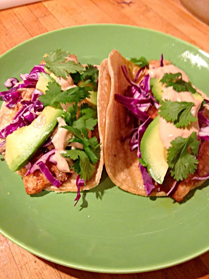 Fish tacos with cabbage, avocado, cilantro and chipotle-lime crema.|Allisonさん