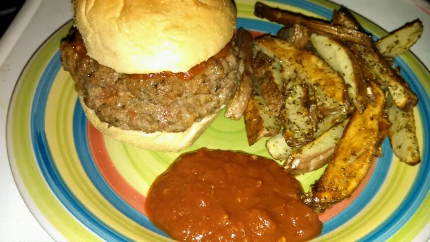 Pizza burger with Italian sausage on a fresh bun with oven fries and marinara...all homemade|Sashi Steinerさん