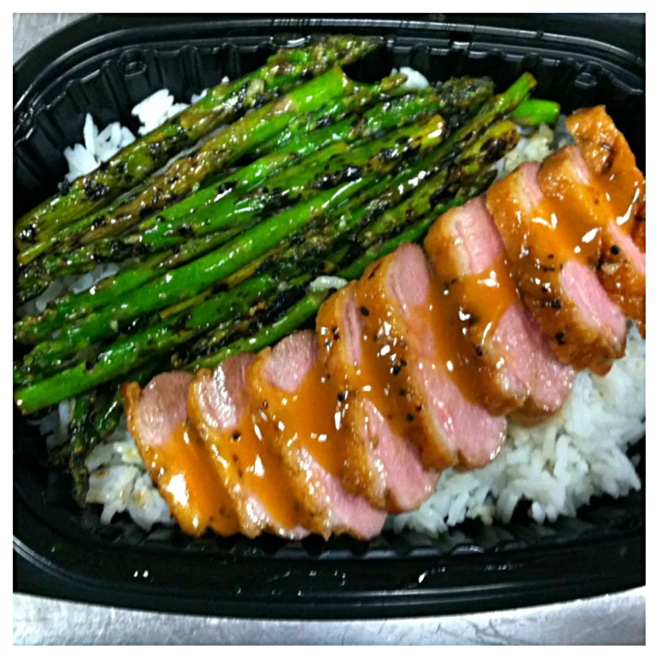 Snapdishの料理写真:Citrus glazed duck breast with grilled asparagus and jasmine rice|Lauren Cordovaさん