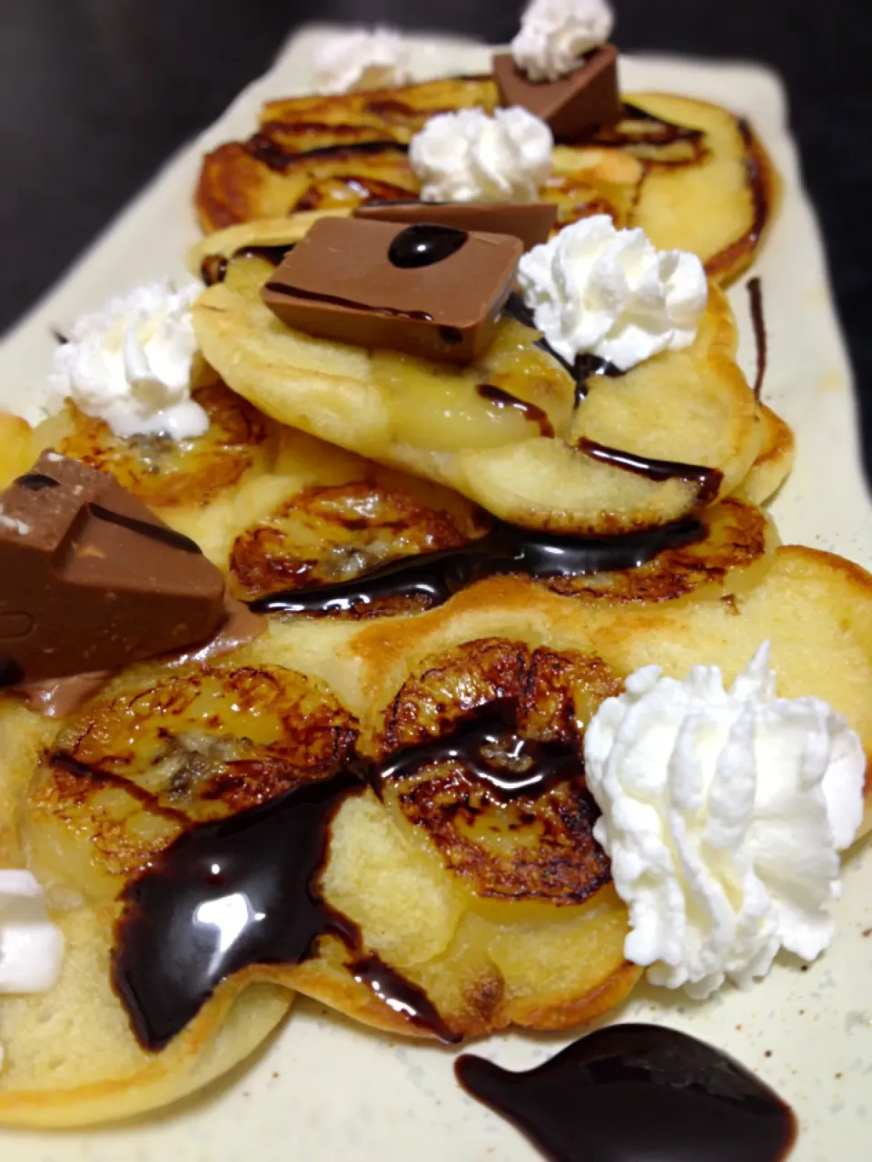 Snapdishの料理写真:Banana Pancakes Topped with Chocolates|Nyam | 照ちゃんさん