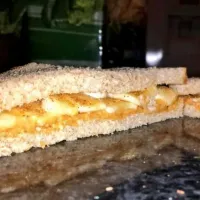 Snapdishの料理写真:Chunky peanut butter, sliced banana and cinnamon on whole wheat bread|Meghan Tracyさん