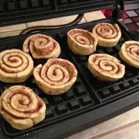 Snapdishの料理写真:Cinnamon rolls on the waffle iron! Makes great waffles!!|David McGuireさん