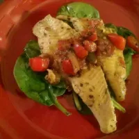 Snapdishの料理写真:Flounder with a tomato relish on a bed of Spinach|tinaさん