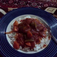 Snapdishの料理写真:white rice with carrot tomatoe stew. (Nigerian)|oziomaさん