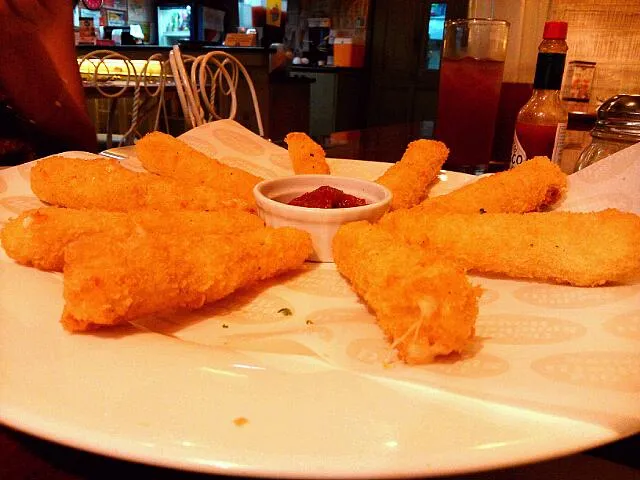 Snapdishの料理写真:mozzarella  sticks :-) #yummy #dipped in  # tomatosauce|Michelle Ann Elazeguiさん