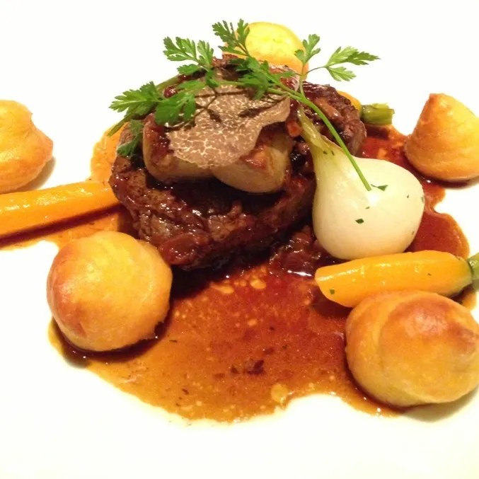 wagyu beef tournedos rossini with truffle reduction, pommes dauphine and sautéed cepes mushrooms|Mei Meiさん