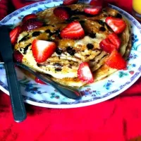 Snapdishの料理写真:Breakfast in bed chocolate chip pancakes with true Canadian maple syrup and strawberries.|Sweet Country Creationsさん